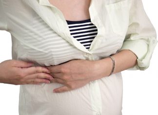 Er gravid med en svie og brændende fornemmelse ved mine ribben. Er det barnet?